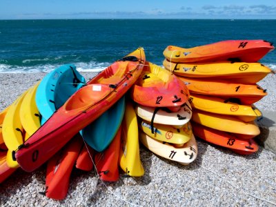 Etretat canoes on the beach photo