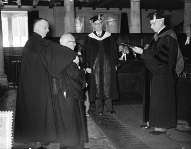 Erepromotie Ds. J. P. van Heest (Ev. Lutherse Kerk). links Ds. C. Pel , rechts …, Bestanddeelnr 907-1740