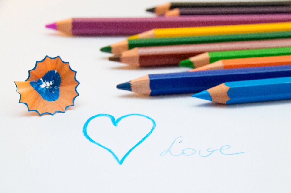 Pens paint colorful wooden pegs