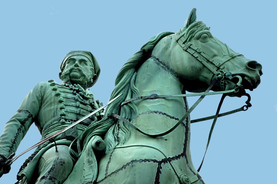 Rider on horse copper monument