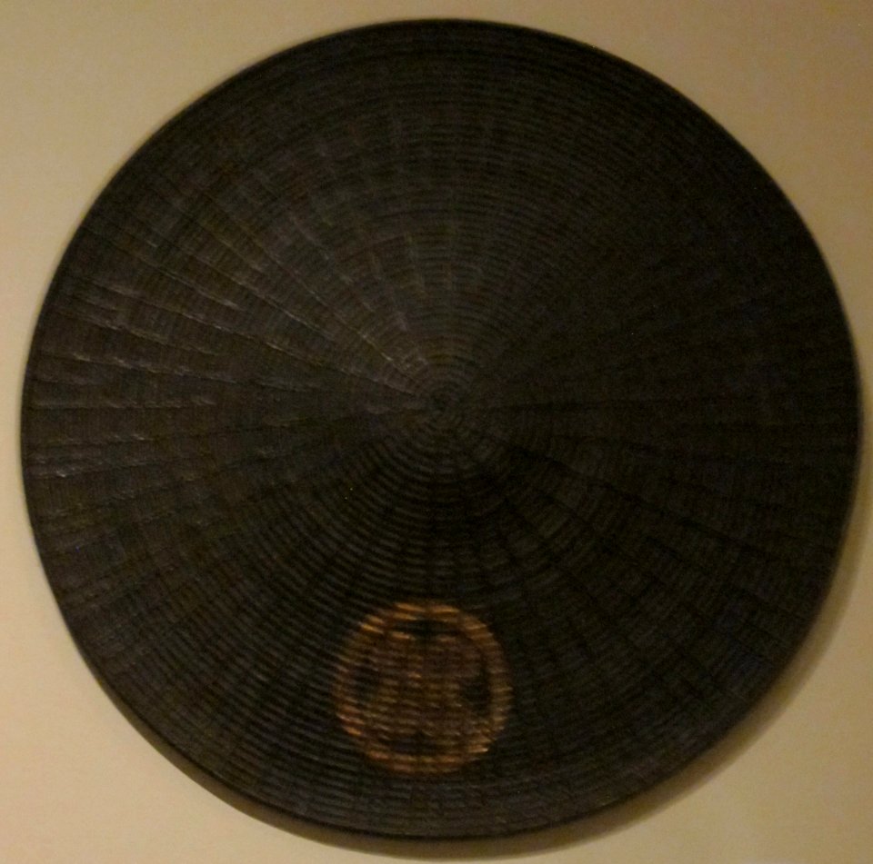 Flat warrior hat of lacquered wickerwork, Edo period, 19th century