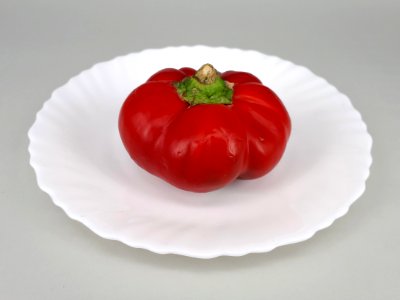 Flat bell pepper on a plate 2017 A