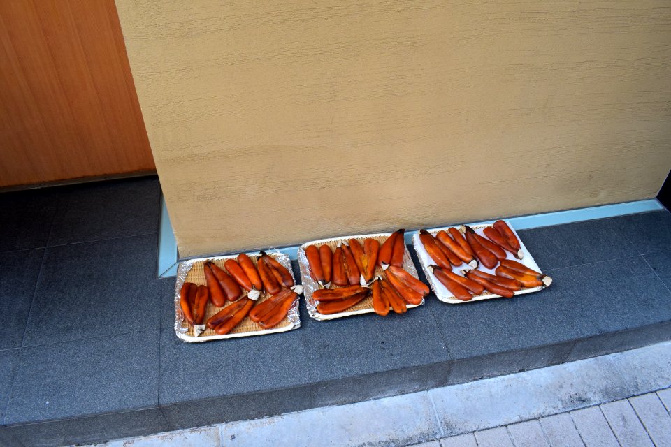 Fish liver or something, drying in the street outside restaurant in Azabujuban