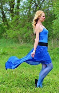 Beauty blue skirt wind photo