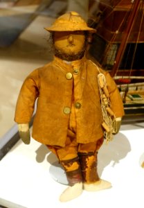 Fisherman doll, maker unknown, c. 1893, exhibited in the Columbian Exposition, oil cloth, twine, leather, horse hair - Cape Ann Museum - Gloucester, MA - DSC01394