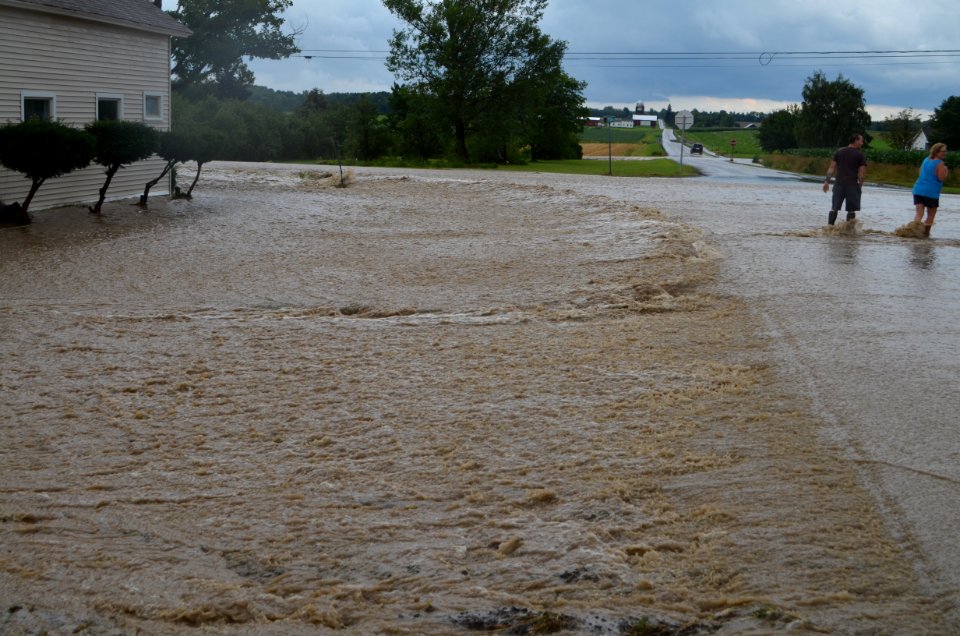 Flash flood Canandaigua NY July 23, 2017 01 river over road through yard