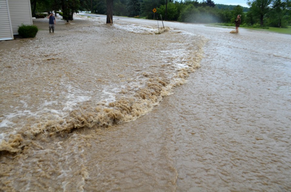 Flash flood Canandaigua NY July 23, 2017 02 river over road through yard