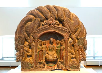 Fragment of Buddhist stele, front, China, Northern Qi dynasty, 550-577 AD, limestone, remains of pigments - Östasiatiska museet, Stockholm - DSC09377