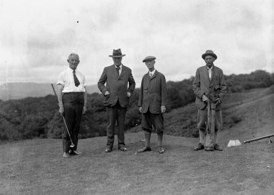 Four gentlemen golfer on the tee of a golf course (1294107)