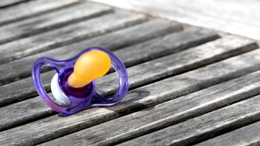 Forgotten pacifier on a table in Röe gård cafe photo