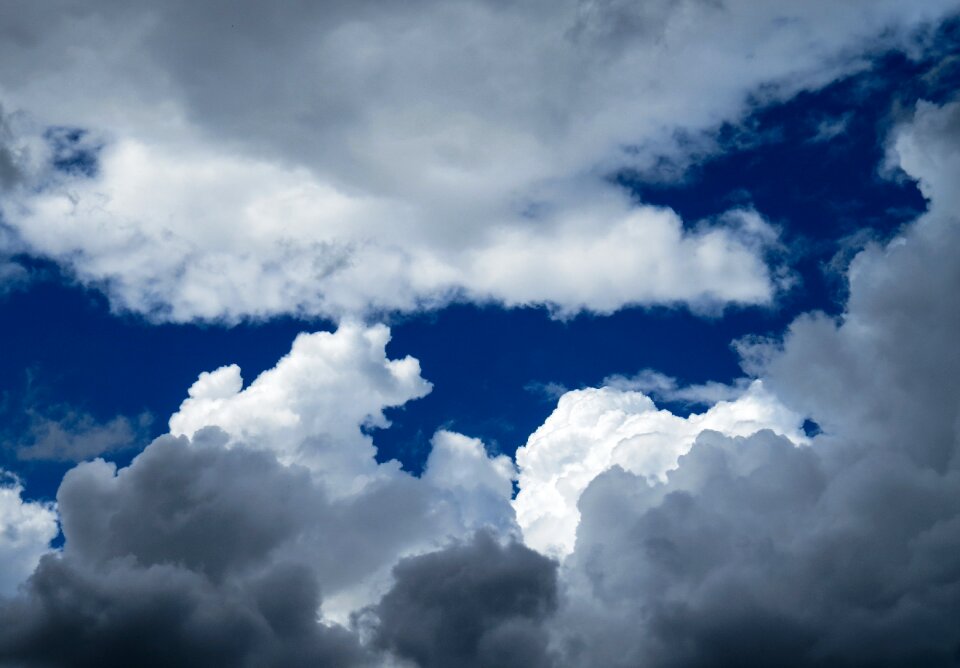 Dark clouds above the clouds blue