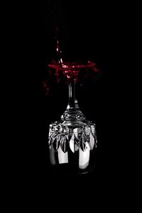 Headstand wine over head wine glass red wine