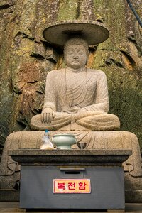 Sculpture zen brown buddha photo