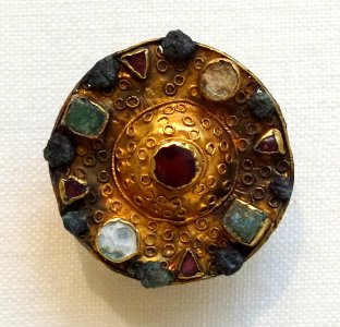 Filigree Bossed Disk Brooch, Frankish, 7th century, Niederbreisig, Rheinland Pfalz, bronze with gold overlay, mother of pearl, garnets, green glass, lent by Met. Museum of Art - Chazen Museum of Art - DSC01935