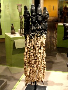 Figures representing Eshu-Elegba, Igbomina Yoruba peoples, Nigeria, 19th century, wood, cowrie shells, hide, and fiber - Hood Museum of Art - DSC09249