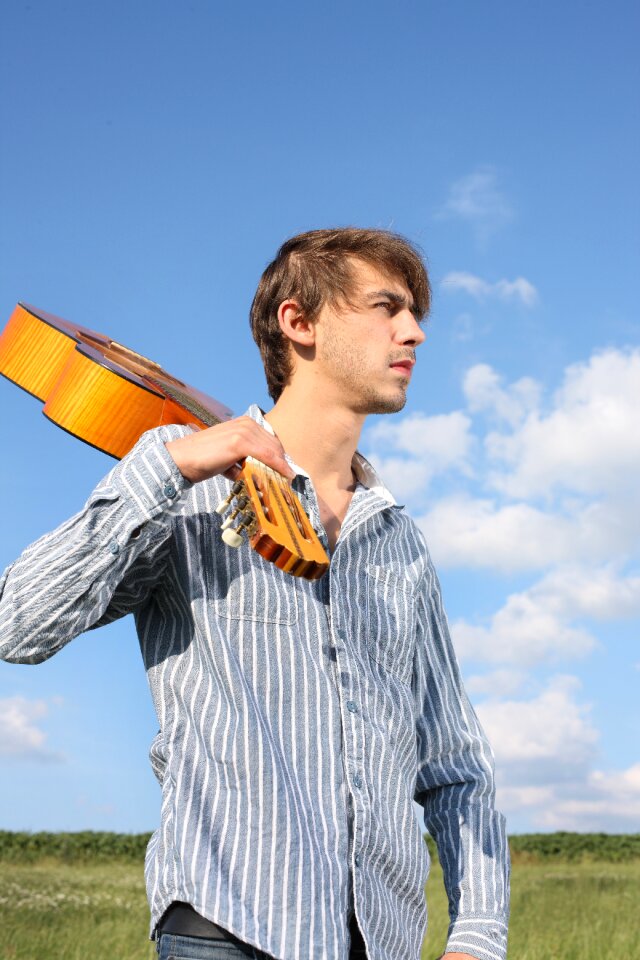 Standing musician guitarist photo