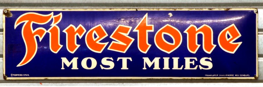 Firestone most miles enamel advert sign at the den hartog ford museum pic-119