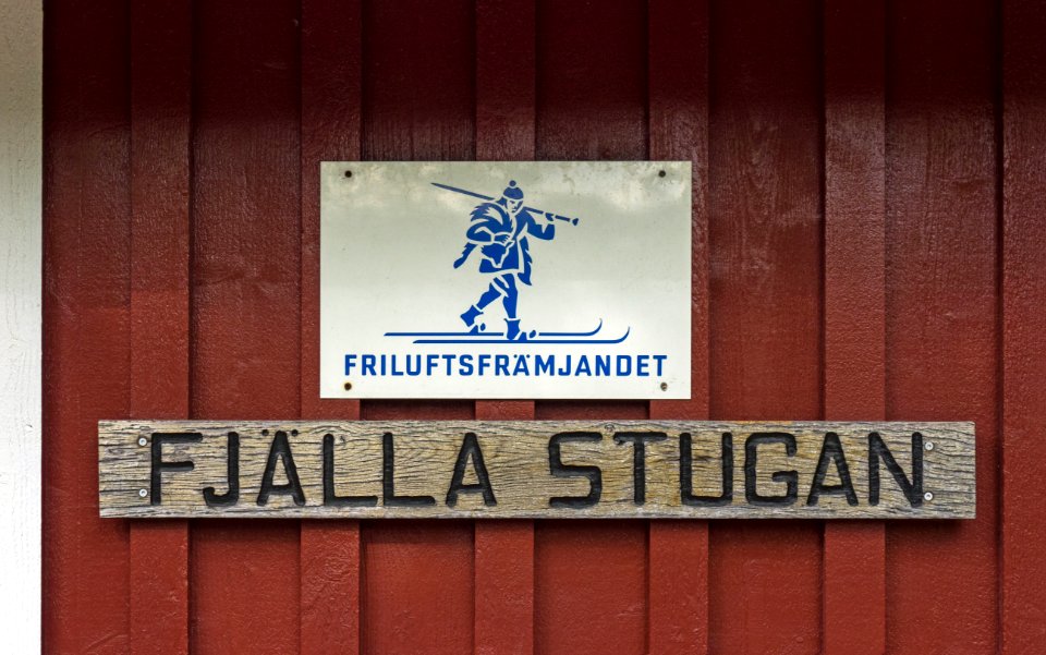 Fjällastugan sign