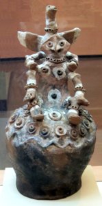 Finial ornament with human figure surmounted by a totemic bird, Papua New Guinea