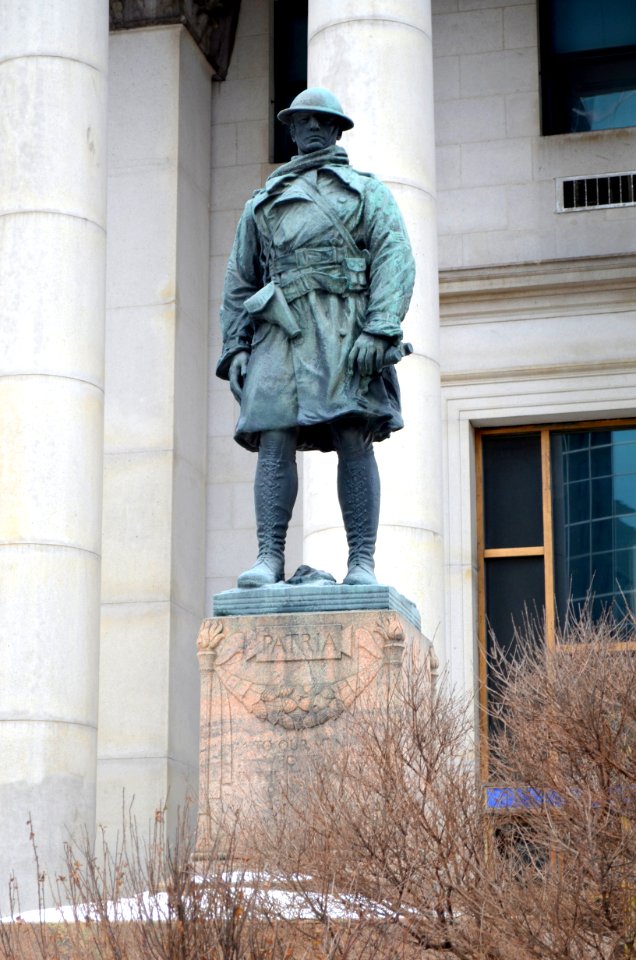 First World War Memorial statue in front of Bank of Montreal