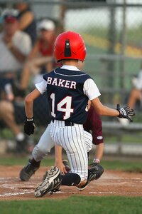 Action sliding home plate photo