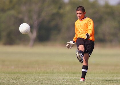 Kicking kick ball photo