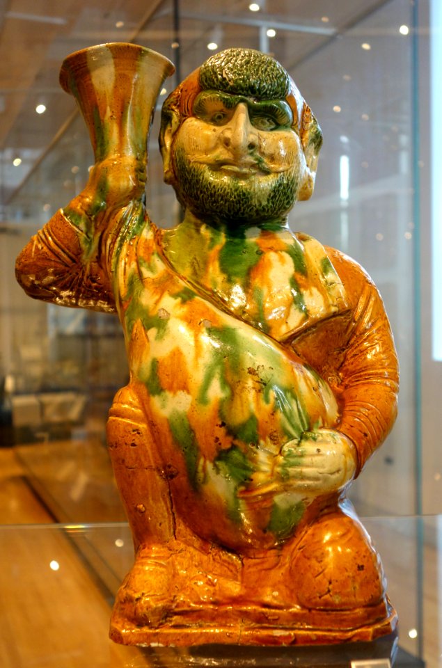 Figurine of a foreigner with wineskin, China, Tang dynasty, c. 675-750, glazed earthenware - Royal Ontario Museum - DSC04052