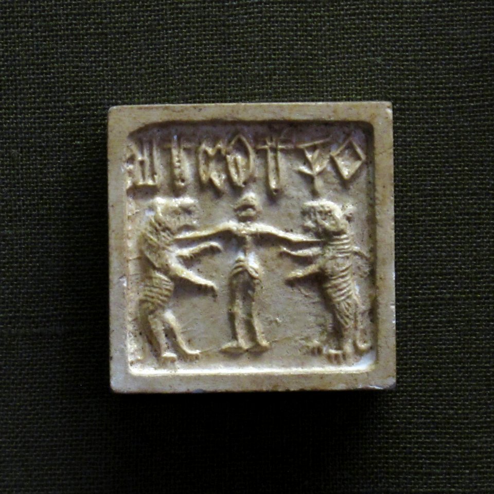 Figure between two tigers. Mold of Seal, Indus valley civilization