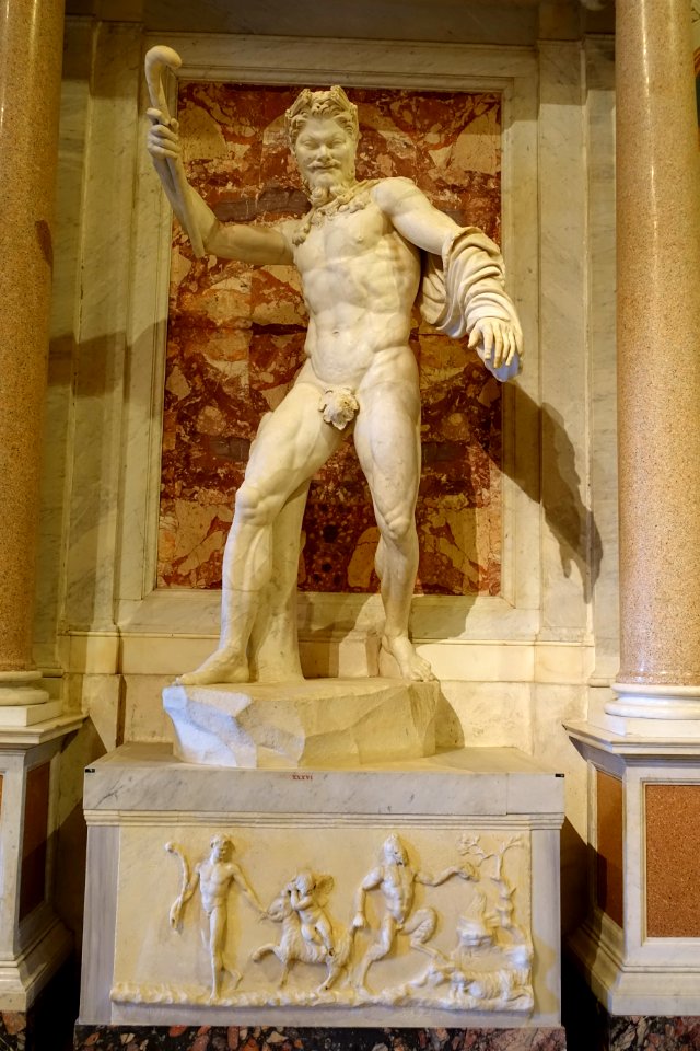 Fighting satyr, Roman, after a bronze by a follower of Lysippus, atop plinth with relief of Dionysian scene, marble - Galleria Borghese - Rome, Italy - DSC04927