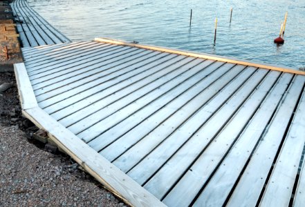 Frosty wooden jetty in Govik photo