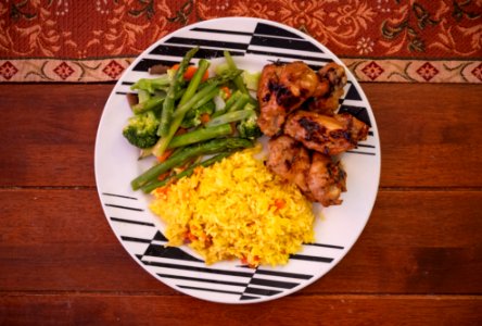 Fried chicken with vegetables and rice photo