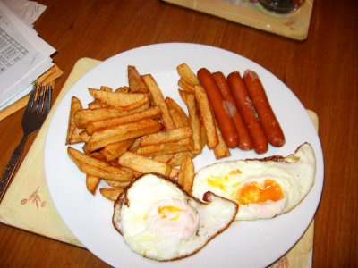 Fried Eggs, chips and hot dogs photo