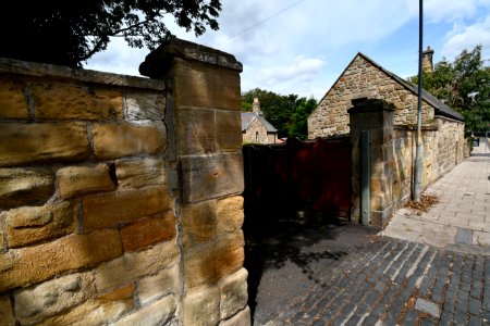 Front Wall And Gateways To The Hall And Hallsteads