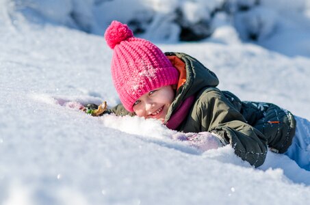 Winter the little girl snow