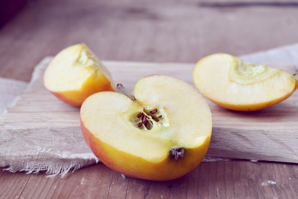 Sliced apple natural product wooden board photo