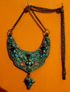 Garuda pendant, Nepal, 20th century, silver, turquoise, lapis, coral, glass - Fernbank Museum of Natural History - DSC00087