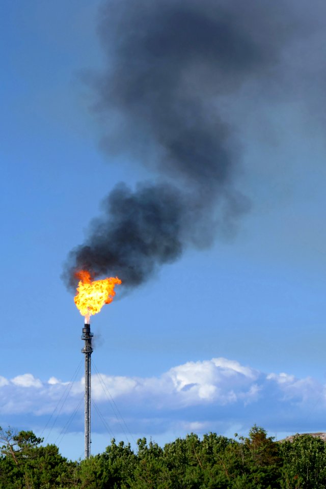 Gas flare on top of a flare stack at Preemraff Lysekil 2