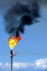 Gas flare on top of a flare stack at Preemraff Lysekil 5 photo