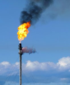 Gas flare on top of a flare stack at Preemraff Lysekil 6 photo