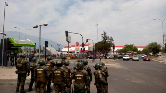 Fuerzas Especiales de Carabineros vigilando protesta en la rotonda Grecia (Santiago de Chile), 2019.10.19 photo