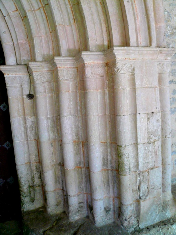 Gámiz - Iglesia de Santa Eulalia, portada tardorrománica con arquería apuntada protogótica 02