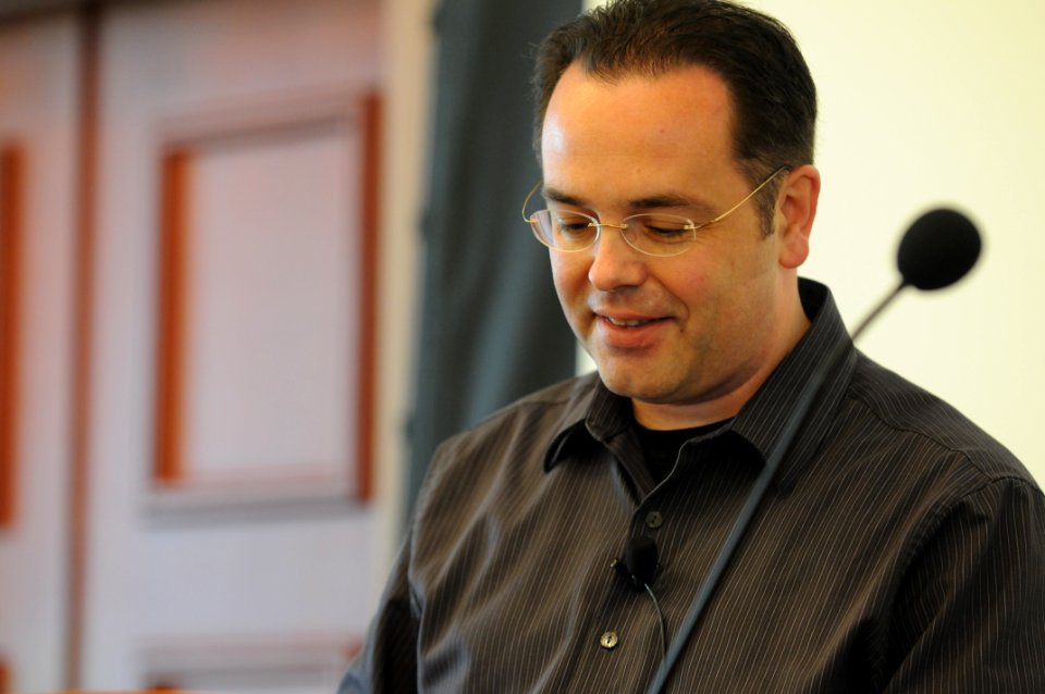 Frank Schulenberg looking down at Skype call