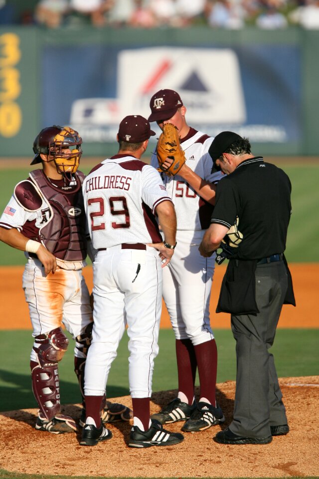 Coach pitcher's mound sport