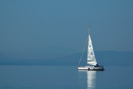 Boat blue water photo