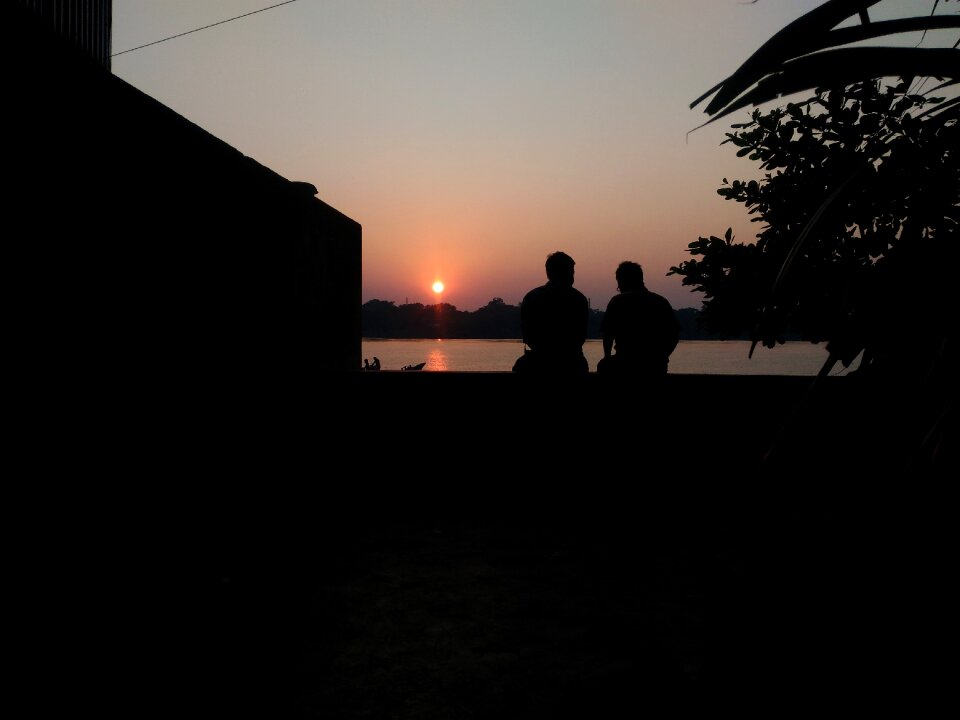 Friendship morning sun riverbank