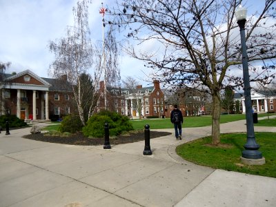 Fraternity quad and flag at the University of Rochester