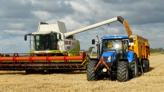 Arable farming harvest time agricultural vehicles photo