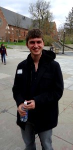 Freshman tour guide pausing for photo at Cornell University