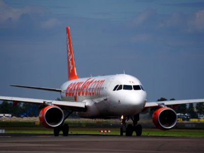 G-EZTX easyJet Airbus A320-214 taxiing at Schiphol (AMS - EHAM), The Netherlands, 18may2014, pic-3 photo