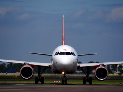 G-EZTX easyJet Airbus A320-214 taxiing at Schiphol (AMS - EHAM), The Netherlands, 18may2014, pic-4 photo